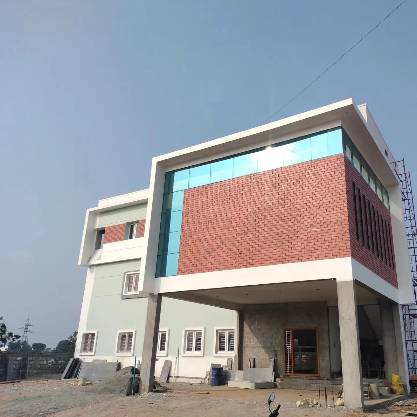 Completed commercial building with brick and glass facade